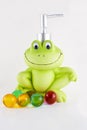 Frog soap dispenser and bath pearls Royalty Free Stock Photo