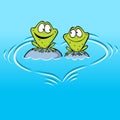 Frogs In Love sitting on a stone in water