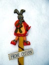 Frohe Ostern Easter bunny in the snow text for happy easter Royalty Free Stock Photo