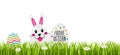 Frohe Ostern - Osterei und Osterhase. Happy Easter with Easter egg and Easter bunny. Royalty Free Stock Photo