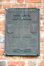 FROMBORK, POLAND. Memorial plaque commemorating the 500th anniversary of the birth of Nikolai Copernicus 1473-1973. Polish text