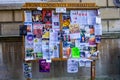 Frome Community notice board covered with leaflets and flyers taken in Frome, Somerset, UK