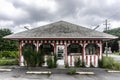 Front of an aged and worn exterior of abandoned store selling ice cream