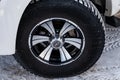 front alloy wheel with yokohama tire of toyota hilux pickup in white color
