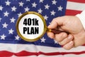 In front of the American flag, a man holds a magnifying glass in his hand with the inscription - 401K PLAN