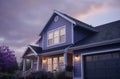 the front of an attractive home with rain pouring down the windows Royalty Free Stock Photo