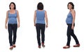 Front, back and side view of full portrait of a same pregnant woman walking and with casual clothes on white background Royalty Free Stock Photo