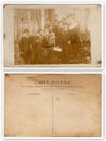 Front and back of vintage photo shows group of people - Czech patriots in France. At the forefront man and woman hold