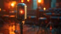 In front of a bokeh light, a retro microphone is on stage Royalty Free Stock Photo