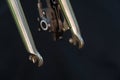 The front brake and the iron chrome-plated rigid bicycle fork are close-up on a black background. Professional bicycle workshop Royalty Free Stock Photo
