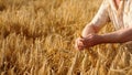 In front of the camera closeup old farmer man very careful analysing the results of harvest from this year Royalty Free Stock Photo