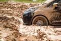 Front of car tire stuck in the mud background Royalty Free Stock Photo