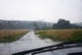 Front car window glass and wipers during heavy rain