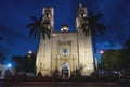 Front of the church San Servacio with palm trees in the night in the downtown of Valladolid, Yucatan, Mexico Royalty Free Stock Photo