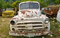 The front of a 1951 Dodge truck parked in a junkyard in Idaho, U