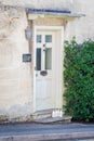 Front Door of a Beautiful Old English Cottage in the Cotswolds Royalty Free Stock Photo