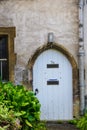 Front Door of a Beautiful Old English Cottage in the Cotswolds Royalty Free Stock Photo