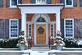 front door with Christmas wreath Royalty Free Stock Photo