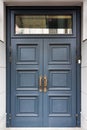 Front door of classic style home. Beautiful entrance of an old house Royalty Free Stock Photo