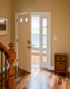 Front door and hall with wooden floor Royalty Free Stock Photo