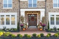 Front door, horizontal view of front door with seasonal decor Royalty Free Stock Photo