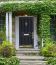 Front door of house surrounded by ivy