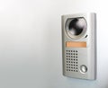 Speaker camera front door intercom with speak button Royalty Free Stock Photo