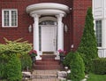 Front door with portico Royalty Free Stock Photo