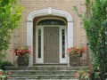 Front door with sidelights and transom window