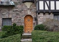 front door of Tudor style stone house