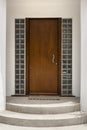 Front door with white exterior Royalty Free Stock Photo