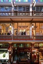 Storefronts on three stories of decorative Victorian shopping mail of Strand Arcade in Sydney CBD, Australia Royalty Free Stock Photo