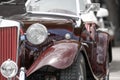 Front end close up view of shiny luxury classic car