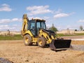 Front end loader at a construction site Royalty Free Stock Photo