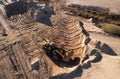 Front-end loader during digging and excavation operations in open pit. Wheel loader load the sand at quarry. Crushed gravel for Royalty Free Stock Photo