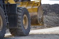 A front end loader machine tipping sand in a Royalty Free Stock Photo