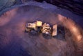 Front end loader working gold ore stockpile