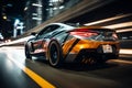 the front end of a sports car driving on a city street at night Royalty Free Stock Photo