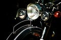 Front end of vintage black motorcycle Royalty Free Stock Photo