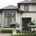 Stucco and Brick Style Home House Exterior Details Royalty Free Stock Photo