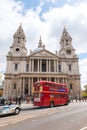 Front facade with bus and taxi passing in front of St Paul s cathedral. Royalty Free Stock Photo