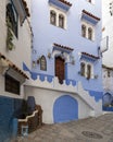 Front facade of a house in Chefchaouen, a city in northwest Morocco noted for its buildings in shades of blue.