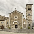 Front facade, steps and Clock Tower of the Holy Savior Church in Castellina in Chianti, Italy.