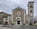Front facade, steps and Clock Tower of the Holy Savior Church in Castellina in Chianti, Italy.