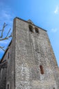 Front of fortified church of Saint-Julien, Nespouls, Correze, Limousin, France Royalty Free Stock Photo