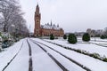 Front frozen Peace Palace garden, International Court of Justice, under the Snow Royalty Free Stock Photo