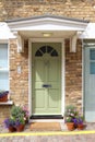 Front Green Door of a Beautiful Georgian Era Town House in London. Royalty Free Stock Photo