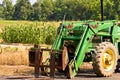 Front of green farm tractor