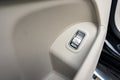 Front handle door panel with buttons of a luxury car