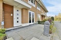 the front of a house with a sidewalk and a